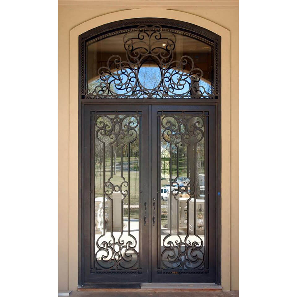 double iron door with arched top and transom