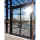 Double iron French door with matte black frame and square top
