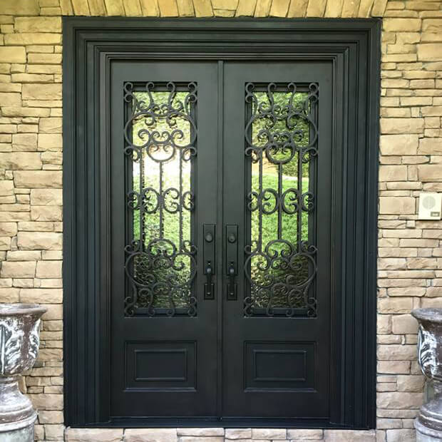 double iron door with matte black frame and beautiful scrollwork