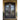 double iron door with arched top and clear glass